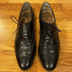 Salvatore Ferragamo mens lace up wingtip shoes.